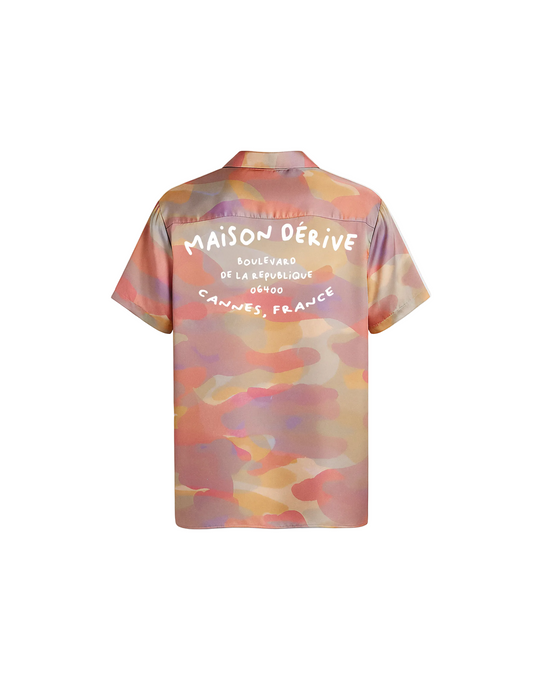 Colorful shirt with text on a light gray background